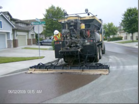 slurry seal being applied